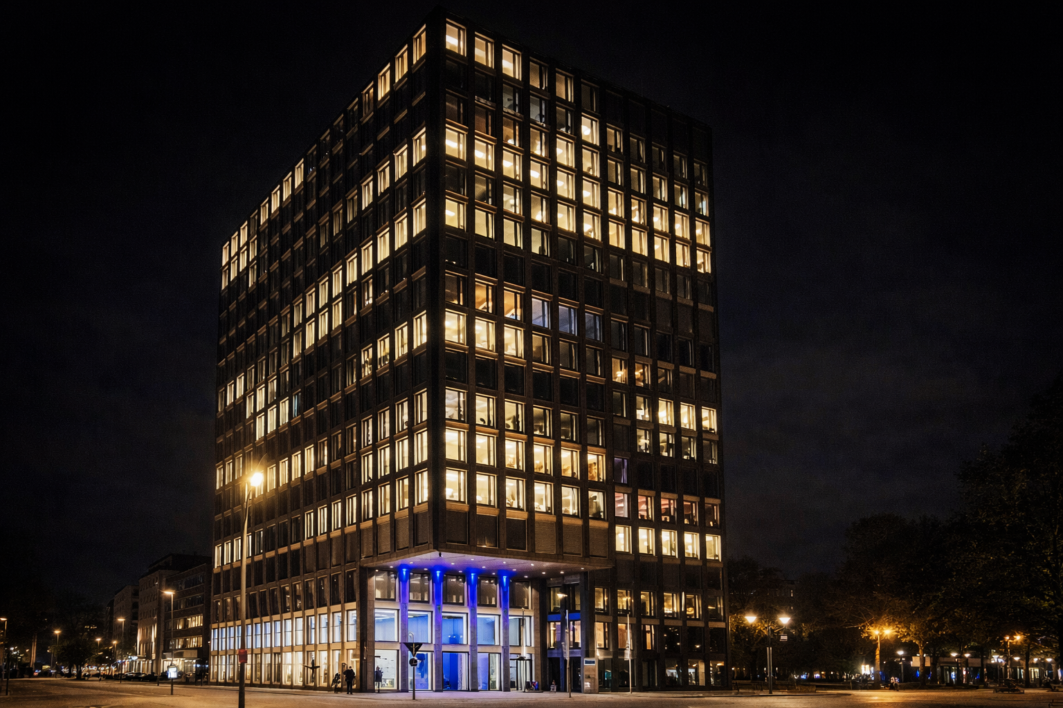 Büro- und Verwaltungsgebäude in Hamburg, kommentiert mit Abdichtungs- und Reparaturarbeiten 1992, tagsüber beleuchtet, städtische Fassadenstruktur.